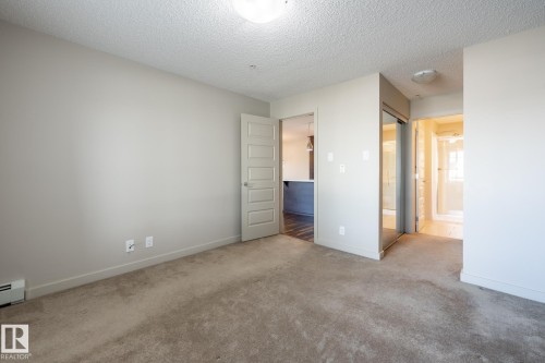 116 4008 Savaryn Drive, Edmonton, AB - Indoor Photo Showing Other Room
