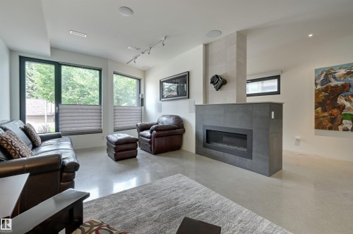 50 Sylvancroft Lane, Edmonton, AB - Indoor Photo Showing Living Room With Fireplace
