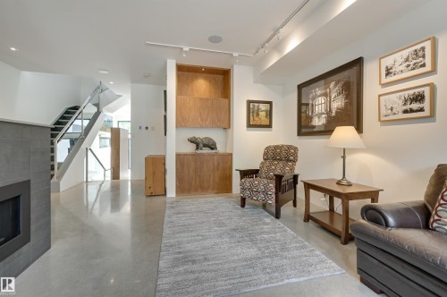 50 Sylvancroft Lane, Edmonton, AB - Indoor Photo Showing Living Room With Fireplace