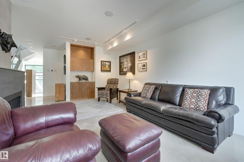 50 Sylvancroft Lane, Edmonton, AB - Indoor Photo Showing Living Room With Fireplace