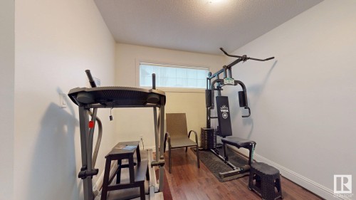 5440 1A Avenue, Edmonton, AB - Indoor Photo Showing Gym Room