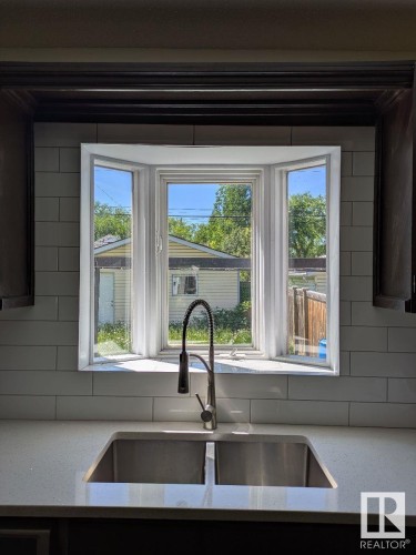 11242 95A Street, Edmonton, AB - Indoor Photo Showing Kitchen With Double Sink