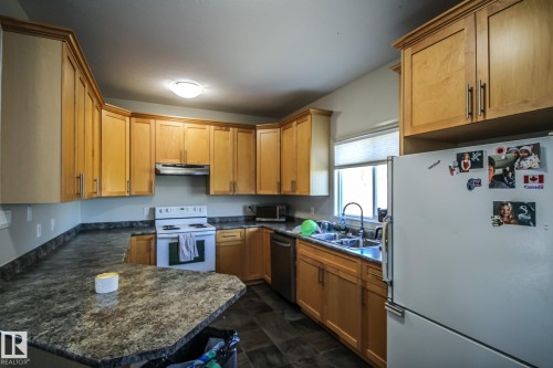 #2 1501 8 Ave, Cold Lake, AB - Indoor Photo Showing Kitchen With Double Sink