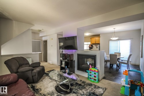 #2 1501 8 Ave, Cold Lake, AB - Indoor Photo Showing Living Room With Fireplace