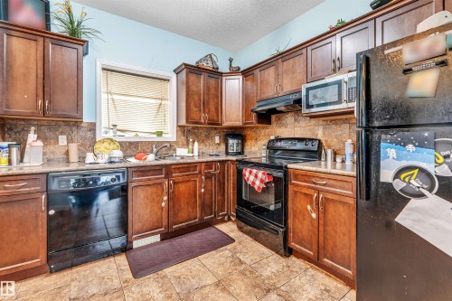 5108 146 Avenue, Edmonton, AB - Indoor Photo Showing Kitchen With Double Sink