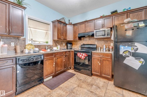5108 146 Avenue, Edmonton, AB - Indoor Photo Showing Kitchen With Double Sink