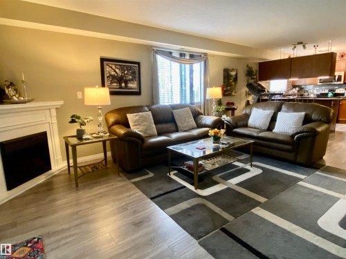 306 260 Lewis Estates Boulevard, Edmonton, AB - Indoor Photo Showing Living Room With Fireplace