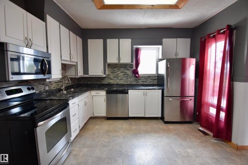 4629 46 Avenue, St. Paul Town, AB - Indoor Photo Showing Kitchen With Stainless Steel Kitchen With Double Sink