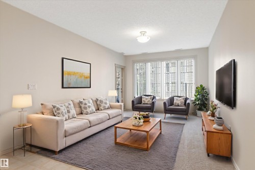 111 9820 165 Street, Edmonton, AB - Indoor Photo Showing Living Room