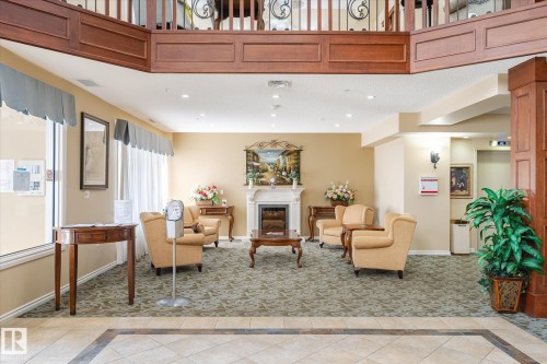 111 9820 165 Street, Edmonton, AB - Indoor With Fireplace