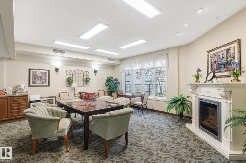111 9820 165 Street, Edmonton, AB - Indoor With Fireplace