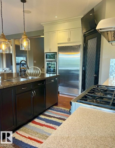 6004 32 Avenue, Beaumont, AB - Indoor Photo Showing Kitchen With Double Sink