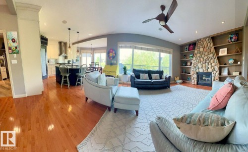 6004 32 Avenue, Beaumont, AB - Indoor Photo Showing Living Room With Fireplace