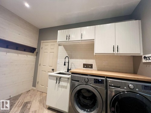 6004 32 Avenue, Beaumont, AB - Indoor Photo Showing Laundry Room