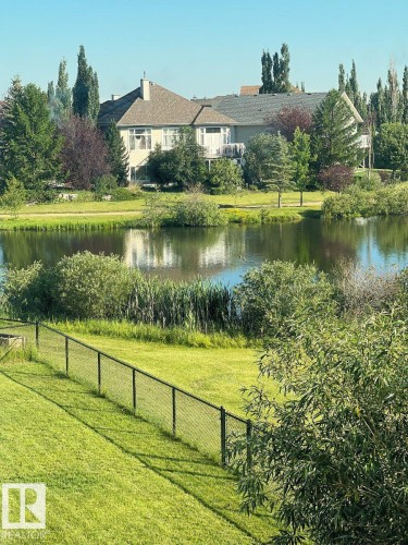 6004 32 Avenue, Beaumont, AB - Outdoor With Body Of Water