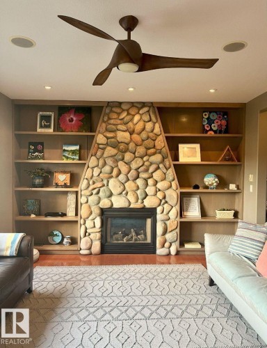 6004 32 Avenue, Beaumont, AB - Indoor Photo Showing Other Room With Fireplace