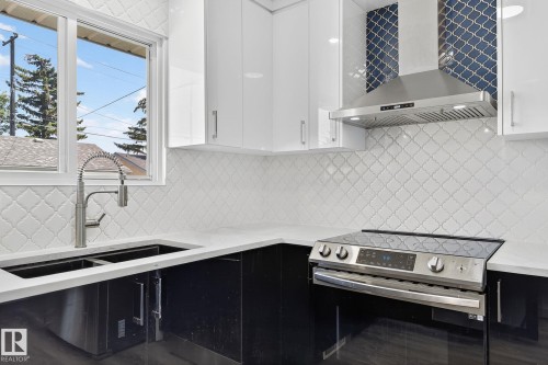 5216 97A Avenue, Edmonton, AB - Indoor Photo Showing Kitchen With Double Sink With Upgraded Kitchen