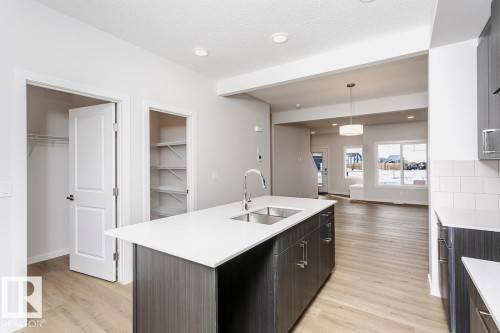 310 Hawthorn Way, Leduc, AB - Indoor Photo Showing Kitchen With Double Sink With Upgraded Kitchen
