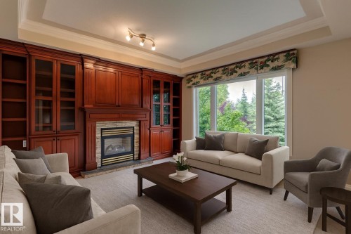 957 Hollingsworth Bend, Edmonton, AB - Indoor Photo Showing Living Room With Fireplace