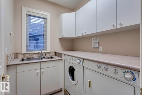 957 Hollingsworth Bend, Edmonton, AB - Indoor Photo Showing Laundry Room