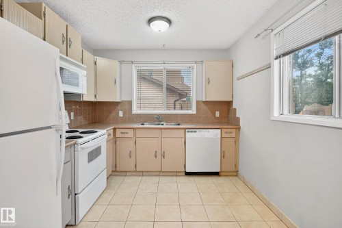 12414 112 Avenue, Edmonton, AB - Indoor Photo Showing Kitchen With Double Sink