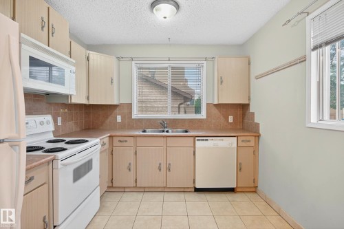 12414 112 Avenue, Edmonton, AB - Indoor Photo Showing Kitchen With Double Sink