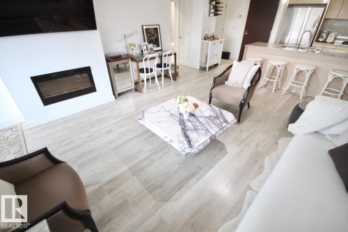 105 2612 109 Street, Edmonton, AB - Indoor Photo Showing Living Room With Fireplace