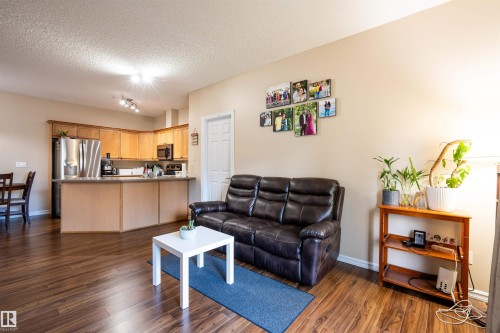 #117 226 Macewan Road Sw, Edmonton, AB - Indoor Photo Showing Living Room