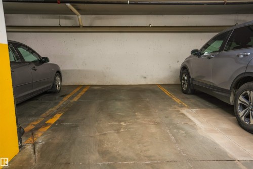 #117 226 Macewan Road Sw, Edmonton, AB - Indoor Photo Showing Garage