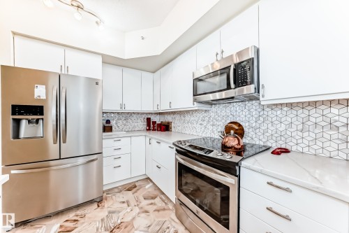 707 10108 125 Street, Edmonton, AB - Indoor Photo Showing Kitchen With Stainless Steel Kitchen With Upgraded Kitchen