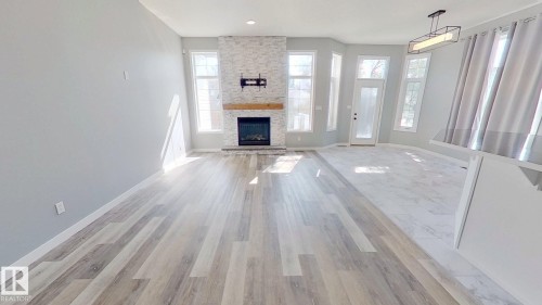 29 Rue Bouchard, Beaumont, AB - Indoor Photo Showing Living Room With Fireplace
