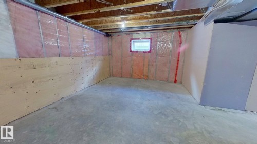 29 Rue Bouchard, Beaumont, AB - Indoor Photo Showing Basement