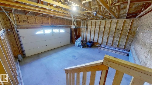 29 Rue Bouchard, Beaumont, AB - Indoor Photo Showing Garage