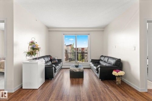 405 304 Ambleside Link, Edmonton, AB - Indoor Photo Showing Living Room