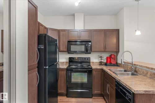 405 304 Ambleside Link, Edmonton, AB - Indoor Photo Showing Kitchen With Double Sink