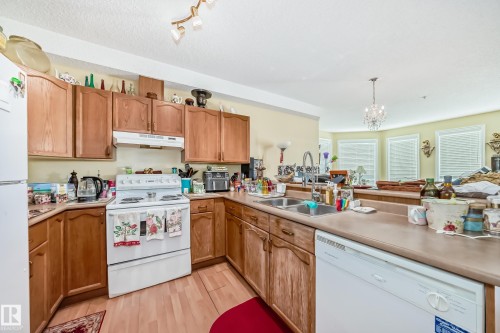 410 9120 156 Street, Edmonton, AB - Indoor Photo Showing Kitchen With Double Sink