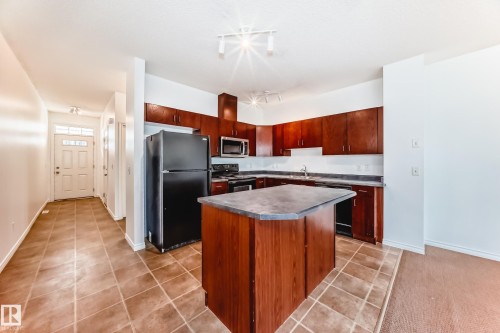 102 3010 33 Avenue Nw, Edmonton, AB - Indoor Photo Showing Kitchen With Double Sink