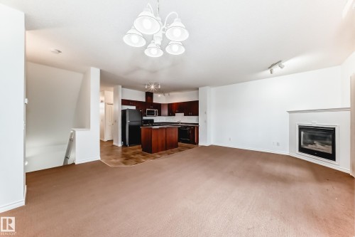 102 3010 33 Avenue Nw, Edmonton, AB - Indoor With Fireplace