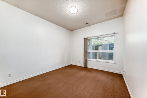102 3010 33 Avenue Nw, Edmonton, AB - Indoor Photo Showing Other Room