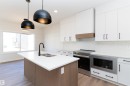 3036 Dixon Landing, Edmonton, AB  - Indoor Photo Showing Kitchen With Double Sink With Upgraded Kitchen 