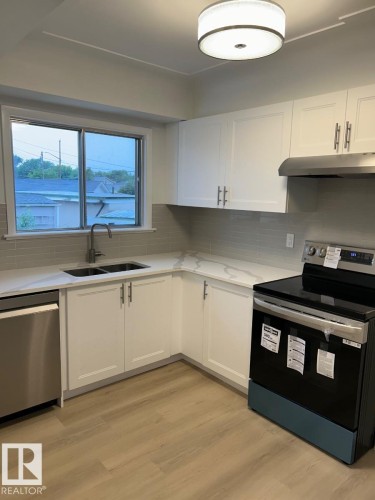 14 O'Brien Drive, Fort Saskatchewan, AB - Indoor Photo Showing Kitchen With Double Sink