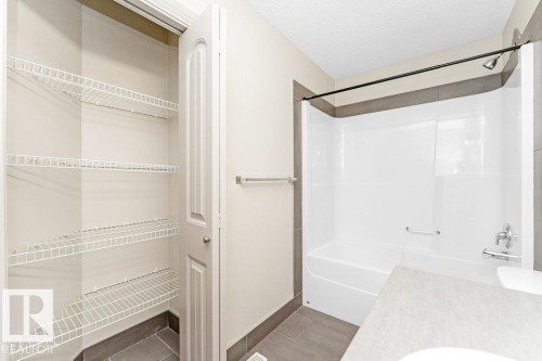 6116 10 Avenue, Edmonton, AB - Indoor With Storage