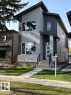 Contemporary house featuring stucco siding, a front yard, and stone siding - 11032 128 Street, Edmonton, AB  - Outdoor 