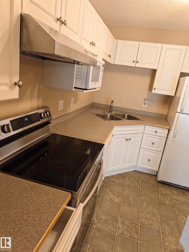 209 7511 171 Street, Edmonton, AB - Indoor Photo Showing Kitchen With Double Sink