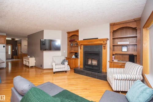 #2-26412 Twp Rd 594, Rural Westlock County, AB - Indoor Photo Showing Living Room With Fireplace
