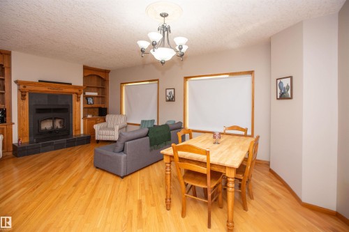 #2-26412 Twp Rd 594, Rural Westlock County, AB - Indoor Photo Showing Living Room With Fireplace