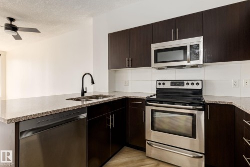 2303 10152 104 Street, Edmonton, AB - Indoor Photo Showing Kitchen With Stainless Steel Kitchen With Double Sink