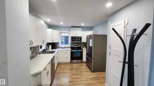8612 104 Street, Edmonton, AB - Indoor Photo Showing Kitchen With Double Sink