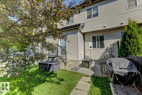Rear view of property featuring a patio area - 18 5281 Terwillegar Boulevard, Edmonton, AB - Outdoor