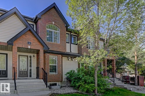View of front of house featuring brick siding - 18 5281 Terwillegar Boulevard, Edmonton, AB - Outdoor With Facade